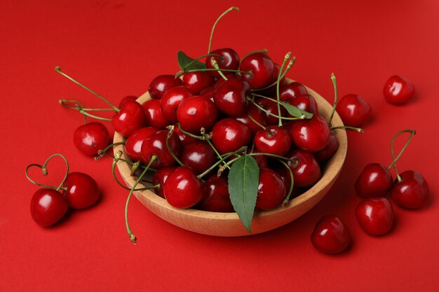 Concept of sweet berry with red cherry
