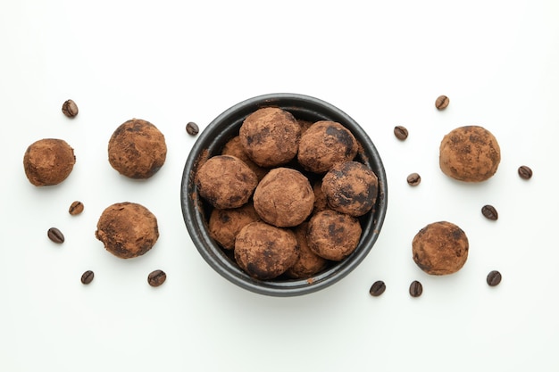 Concept of sweets with truffles on white background