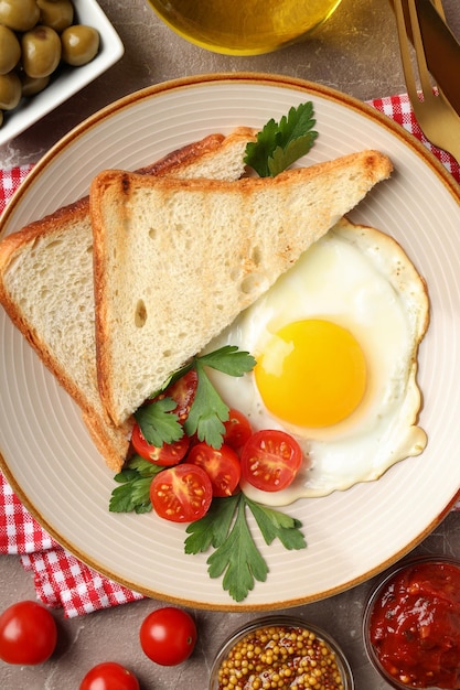 Concept of tasty breakfast on gray textured background