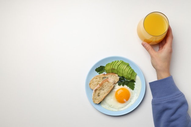 Concept of tasty breakfast on white background