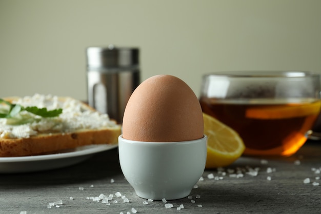 Concept of tasty breakfast with boiled egg, close up