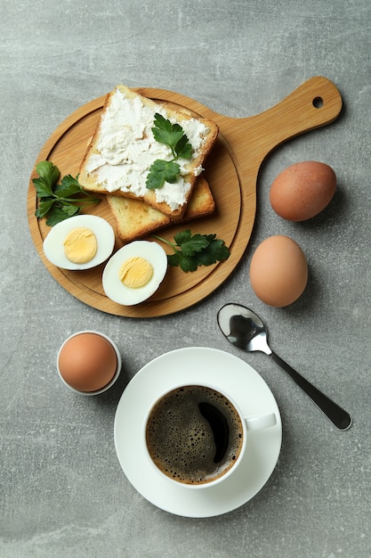 Concept of tasty breakfast with boiled eggs, top view