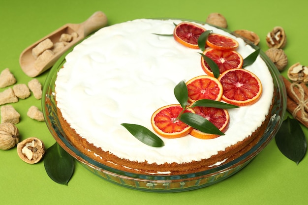 Concept of tasty dessert with meringue pie with citrus closeup