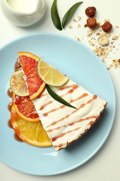 Concept of tasty dessert with meringue pie with citrus top view