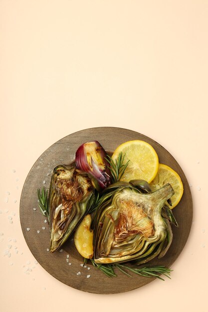 Concept of tasty food grilled artichoke space for text