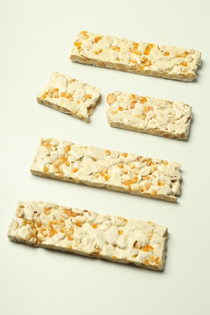 Concept of tasty food on white background nougat