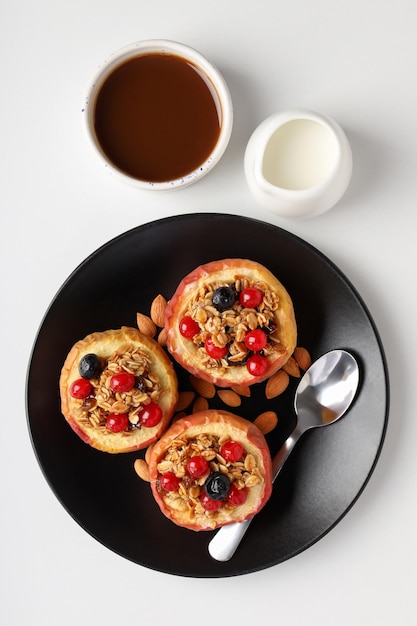 Concept of tasty food with baked apple on white background