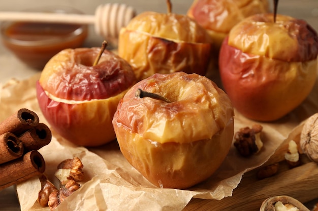 Photo concept of tasty food with baked apples, close up