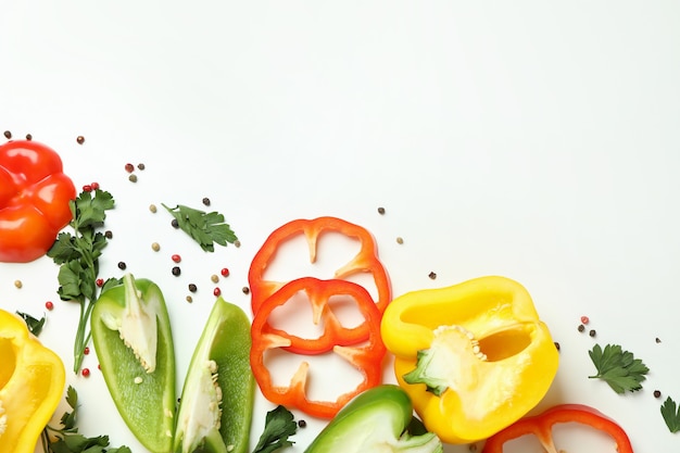 Concept of tasty food with bell pepper on white background