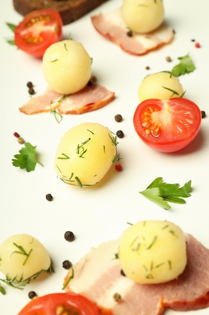 Concept of tasty food with boiled young potatoes close up