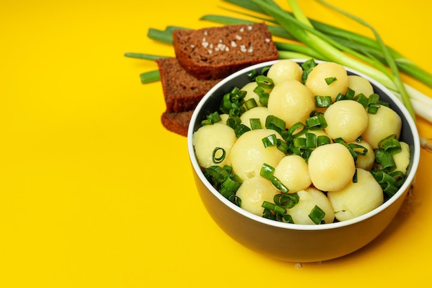 Concept of tasty food with boiled young potatoes space for text