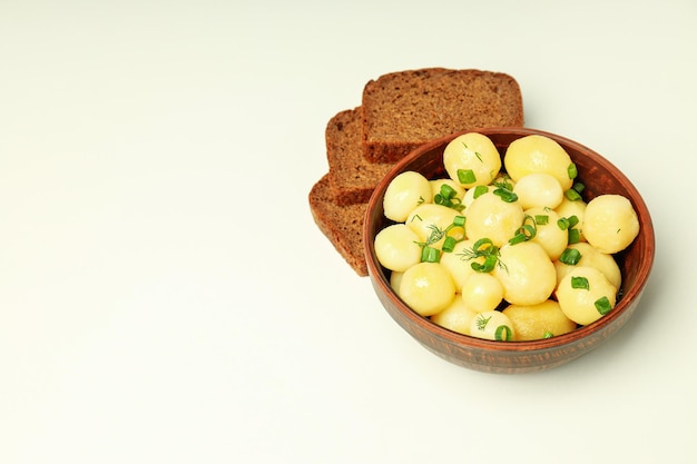 Concept of tasty food with boiled young potatoes space for text