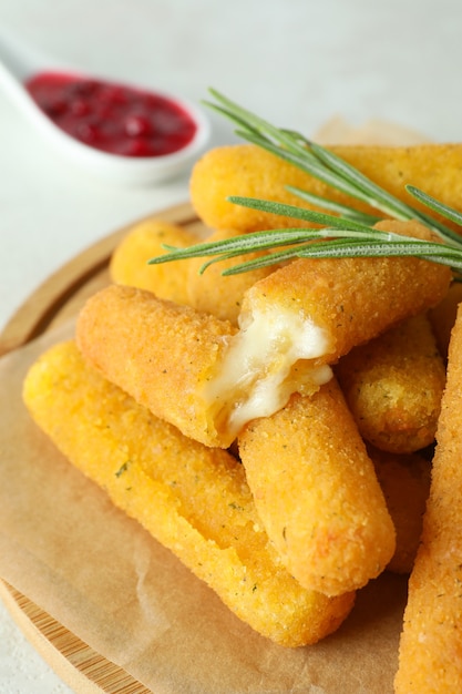 Concept of tasty food with cheese sticks, close up