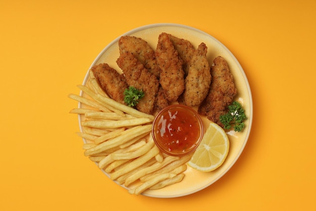 Concept of tasty food with chicken strips top view