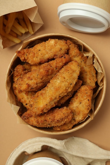 Concept of tasty food with chicken strips top view