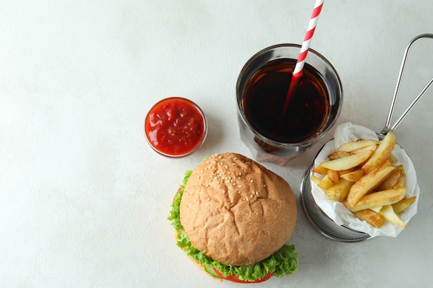 Concept of tasty food with delicious burger