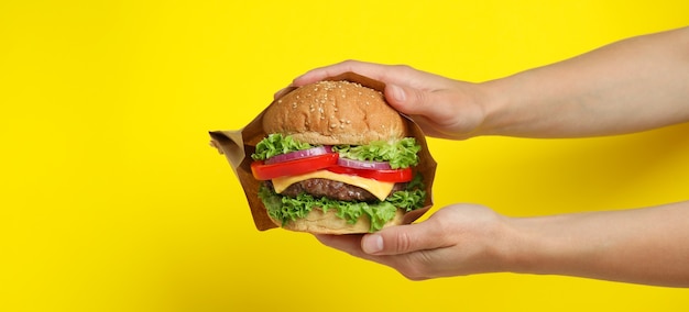 Photo concept of tasty food with delicious burger