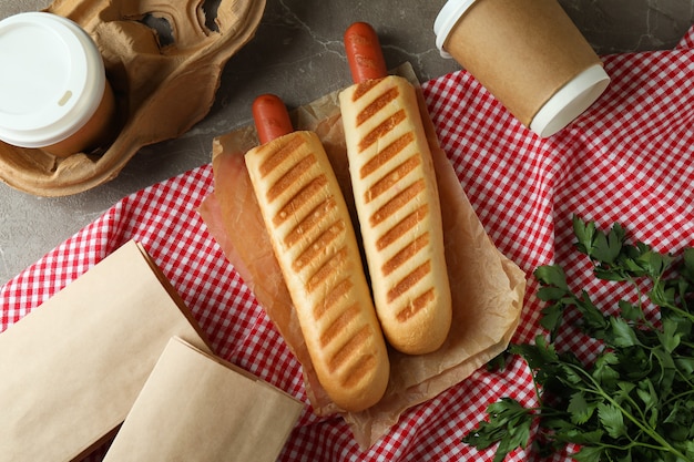 Concept of tasty food with french hot dog