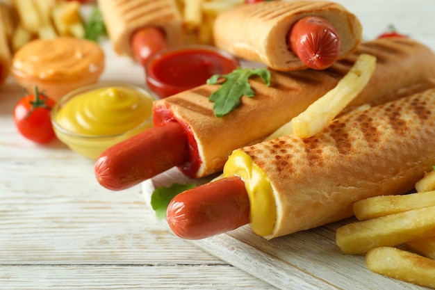 Concept of tasty food with french hot dog