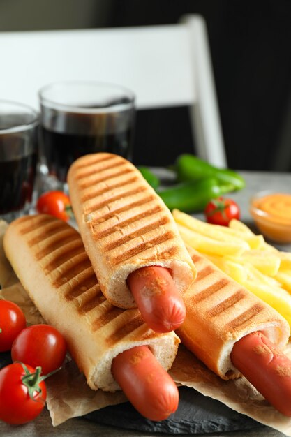 Concept of tasty food with french hot dog