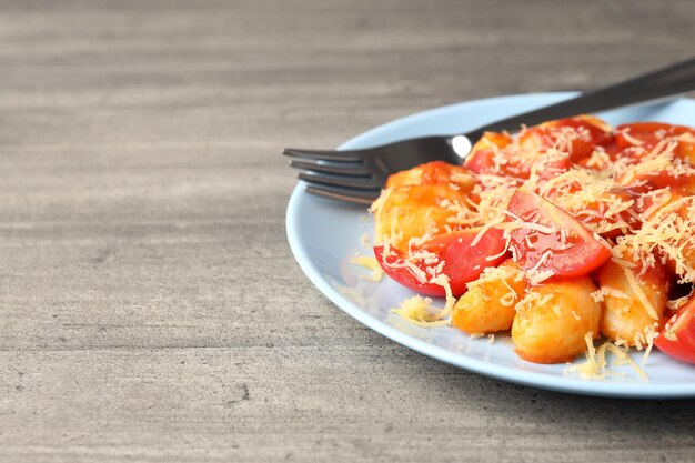 Concept of tasty food with gnocchi space for text