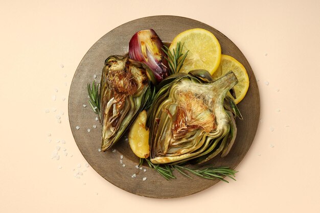 Concept of tasty food with grilled artichoke top view