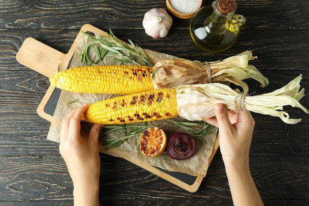 Concept of tasty food with grilled corn
