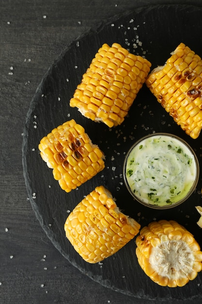 Concept of tasty food with grilled corn