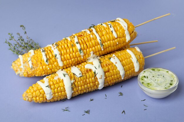 Concept of tasty food with grilled corn