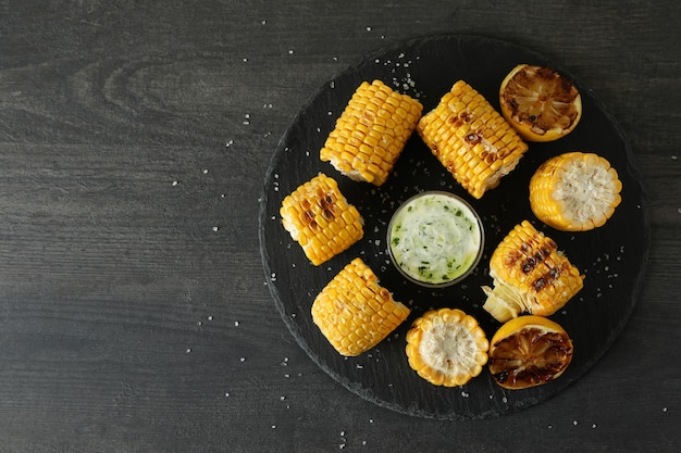 Concept of tasty food with grilled corn