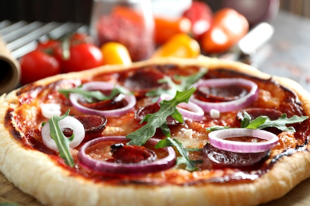 Concept of tasty food with Salami pizza, close up