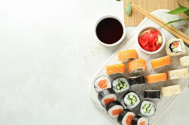 Concept of tasty food with sushi space for text