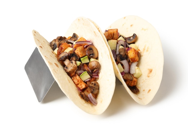 Concept of tasty food with taco on white background