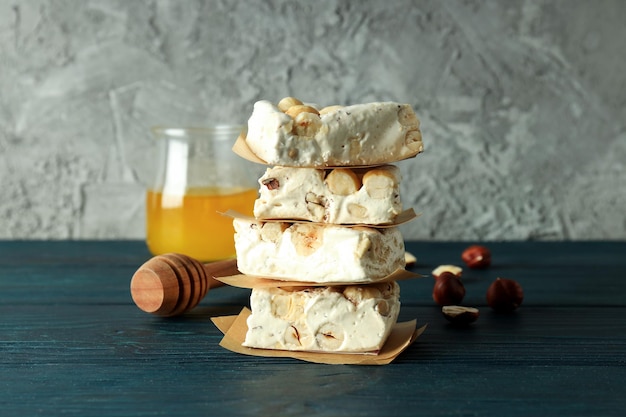 Concept of tasty food on wooden table nougat
