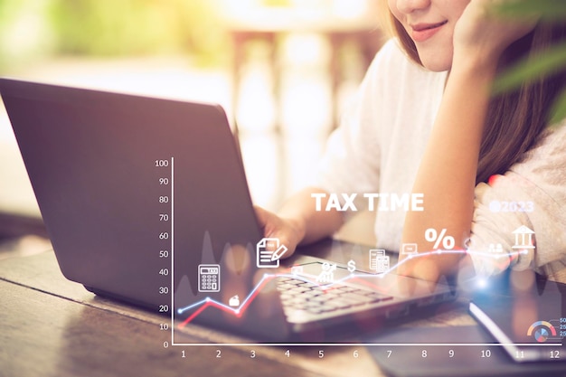 Photo concept of tax payment optimization business finance people with taxes icon on technology screen income tax and property background for business individuals and corporations such as vat