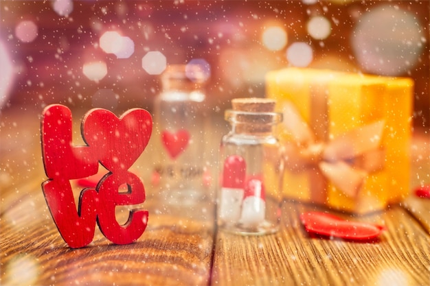 Photo concept of valentine's, anniversary, mother's day and birthday greeting, copyspace, topview.love medicine. i love you .tablets in jars are kissing, happy valentine's day,