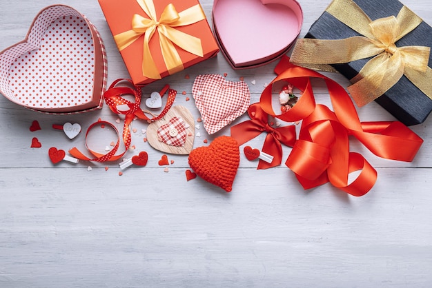 Concept for valentine's day. background with the attributes of the celebration of Valentine's Day. dominant red color. studio shot, top view.