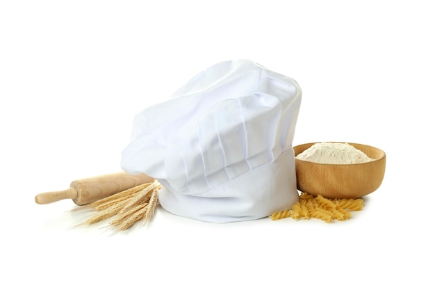Concept van het koken van voedsel met chef-kok hoed geïsoleerd op een witte achtergrond