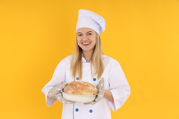 Concept van koken met jonge aantrekkelijke vrouw