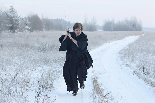 concept of the way Eastern philosophy, the monk samurai in winter field