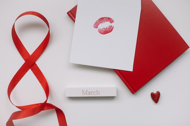 Concept Women39s Day Valentines Day March 8 Lipsticks cosmetic makeup products and accessories flatlay top view