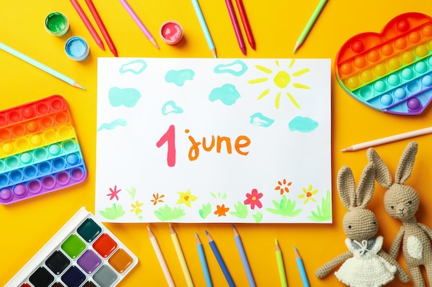 Concept of World Children's Day on orange background