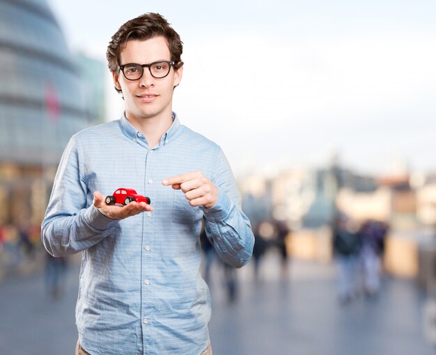 Concept of a young man and a car insurance