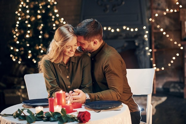 Conception of relationships Young lovely couple have romantic dinner indoors together