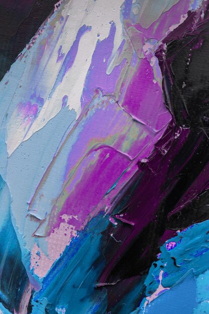 Conceptual abstract in multicolored tones Closeup of a painting by oil and palette knife on canvas