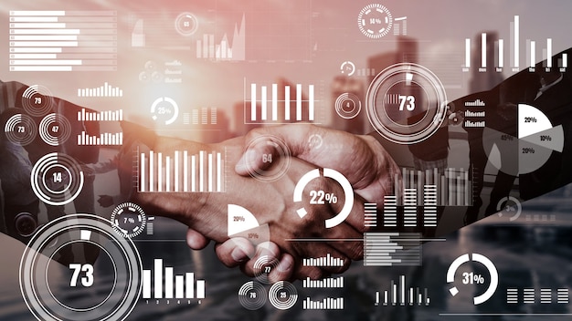 Conceptual business handshake with dashboard for financial data analysis