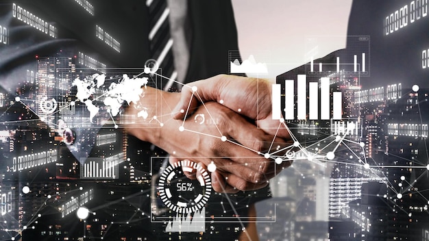 Conceptual business handshake with dashboard for financial data analysis