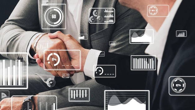 Conceptual business handshake with dashboard for financial data analysis