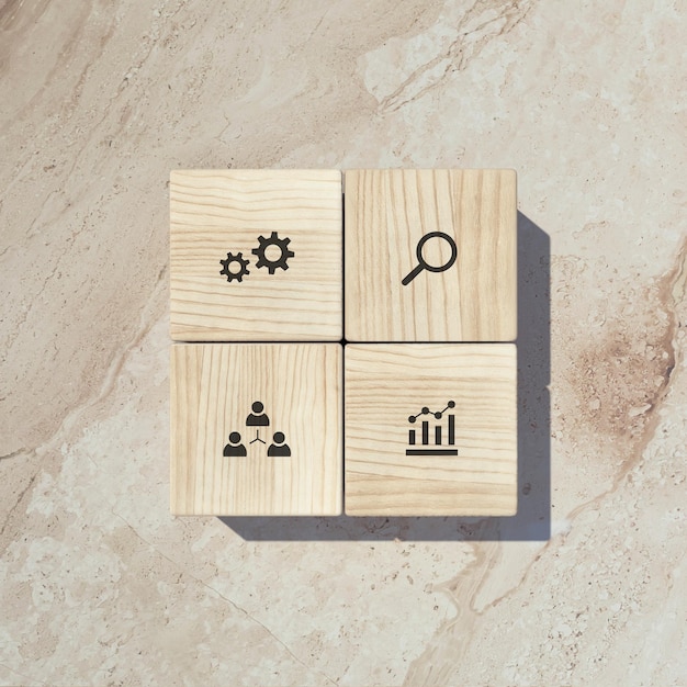 Photo conceptual business illustration with wooden cubes and icons on marble background