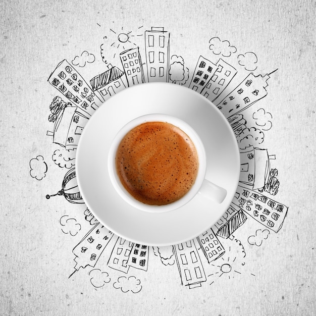 Conceptual image of cup of coffee and modern city concept